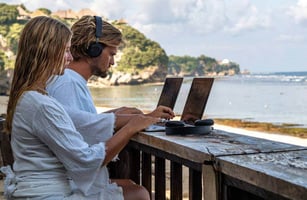 Digital nomad visa applicants for south africa working on a beach